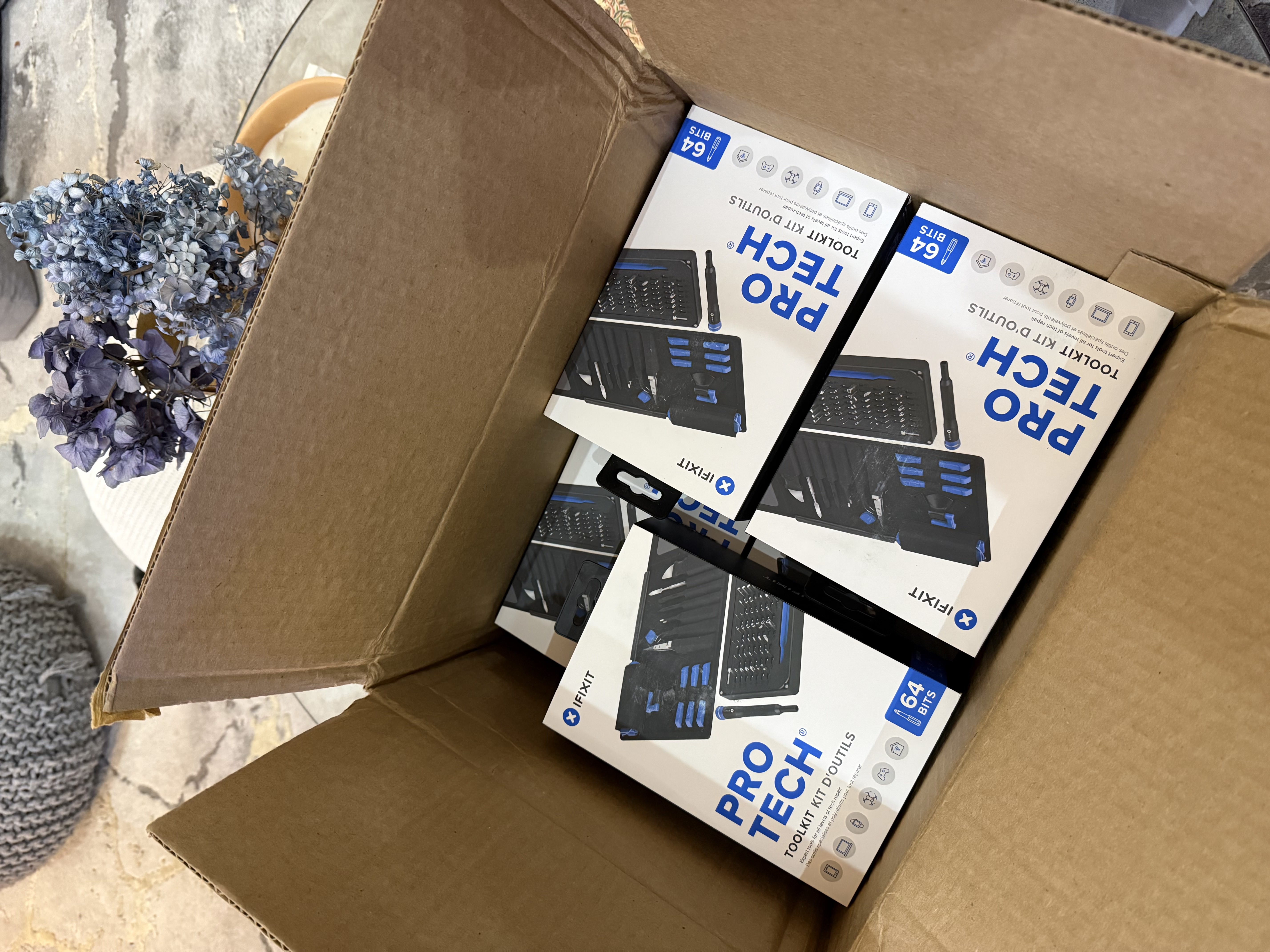 A box of iFixit Pro Tech repair toolkits
