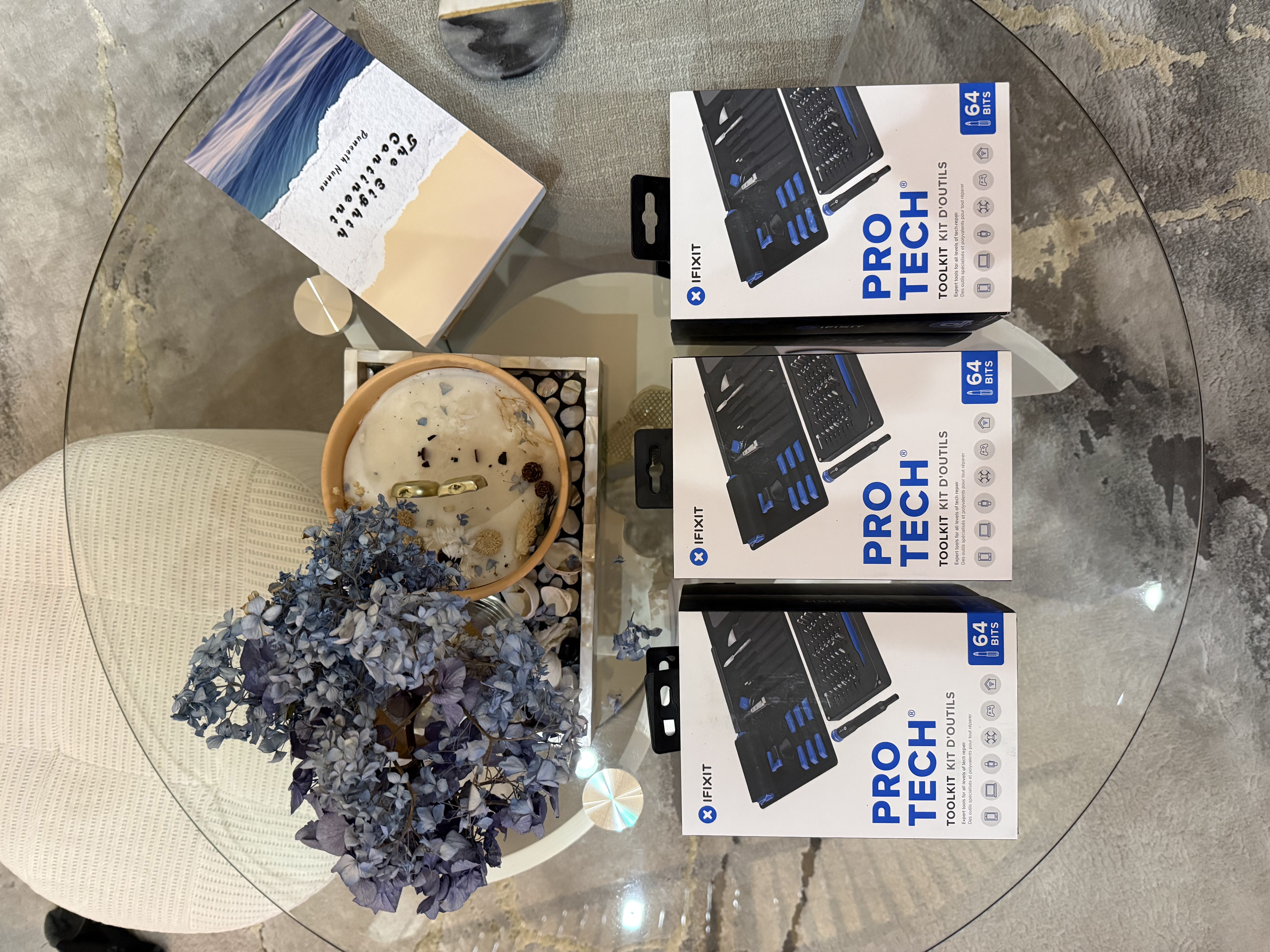 Three iFixit Pro Tech toolkits laid out on a table